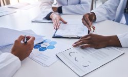 strategy-kpi-business-meeting-with-people-hands-document-paperwork-marketing-research-charts-erp-teamwork-collaboration-corporate-finance-communication-company-data-analytics